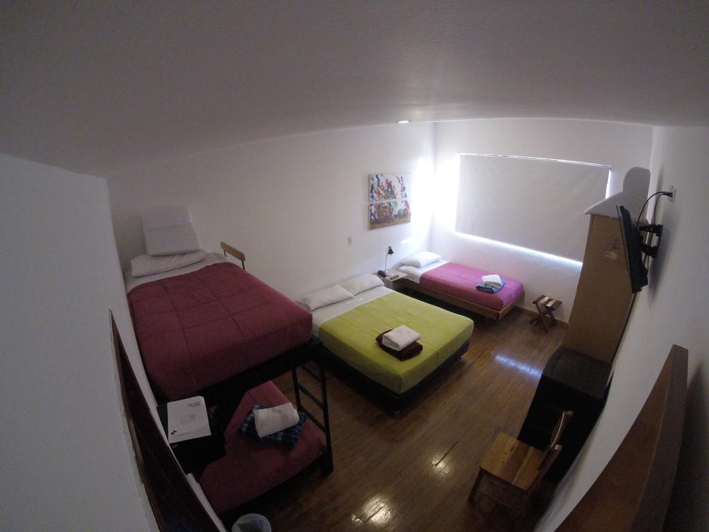 מניזאלס Hostal De La 57 מראה חיצוני תמונה